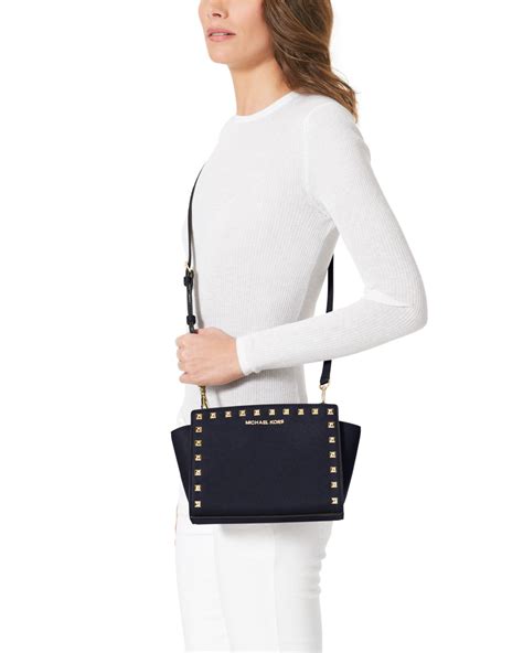 michael kors messenger selma outfit|michael kors selma bag.